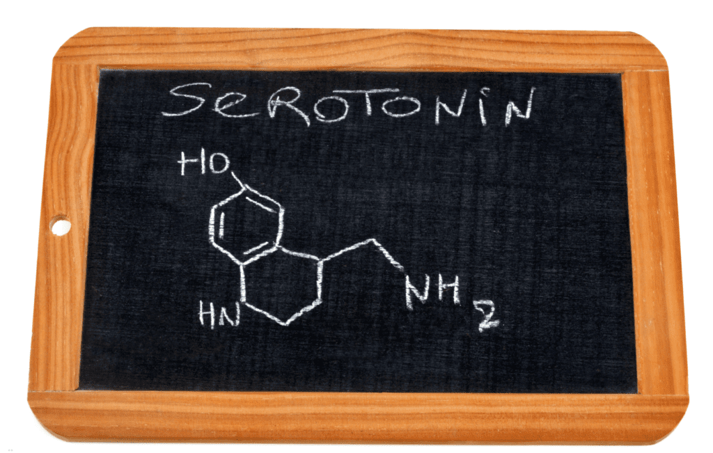 imagem de quadro com desenho de giz da molécula de serotonina
